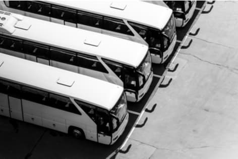 aerial view of multiple charter buses